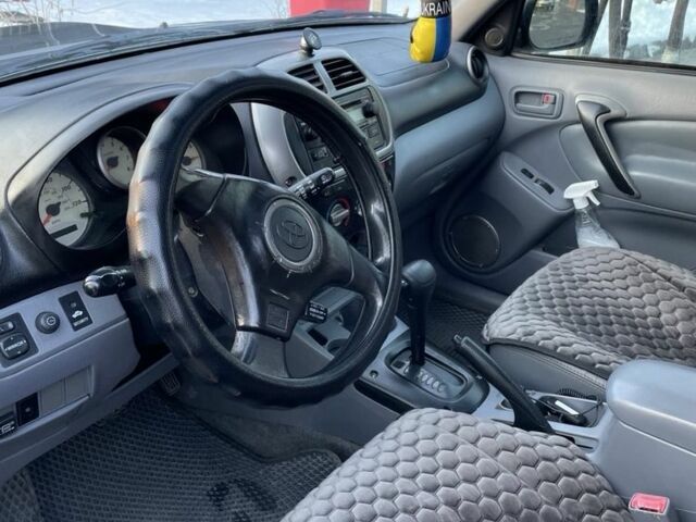 Черный Тойота РАВ 4, объемом двигателя 2 л и пробегом 217 тыс. км за 5400 $, фото 3 на Automoto.ua