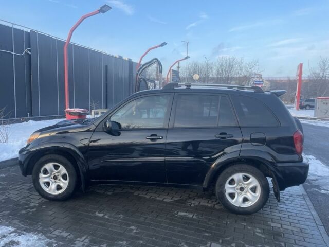 Черный Тойота РАВ 4, объемом двигателя 2 л и пробегом 217 тыс. км за 5400 $, фото 2 на Automoto.ua