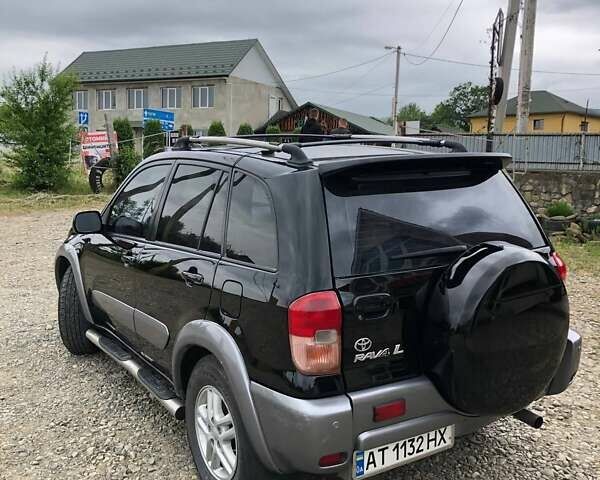 Чорний Тойота РАВ 4, об'ємом двигуна 2 л та пробігом 160 тис. км за 7000 $, фото 2 на Automoto.ua