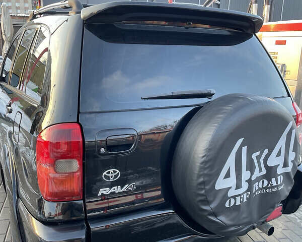 Черный Тойота РАВ 4, объемом двигателя 2 л и пробегом 217 тыс. км за 5800 $, фото 4 на Automoto.ua