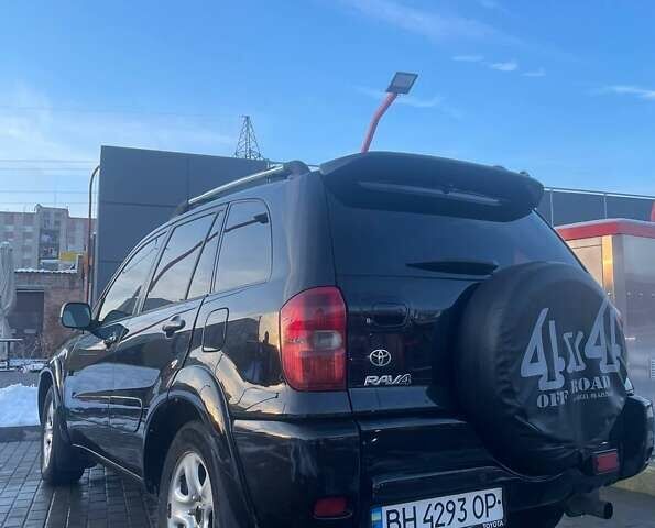 Черный Тойота РАВ 4, объемом двигателя 2 л и пробегом 330 тыс. км за 5400 $, фото 2 на Automoto.ua
