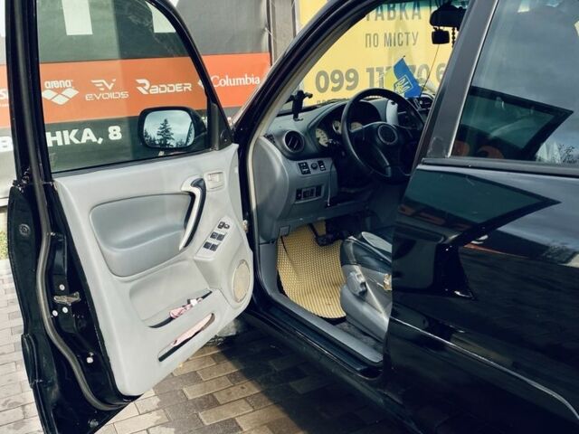 Черный Тойота РАВ 4, объемом двигателя 2 л и пробегом 30 тыс. км за 5000 $, фото 4 на Automoto.ua