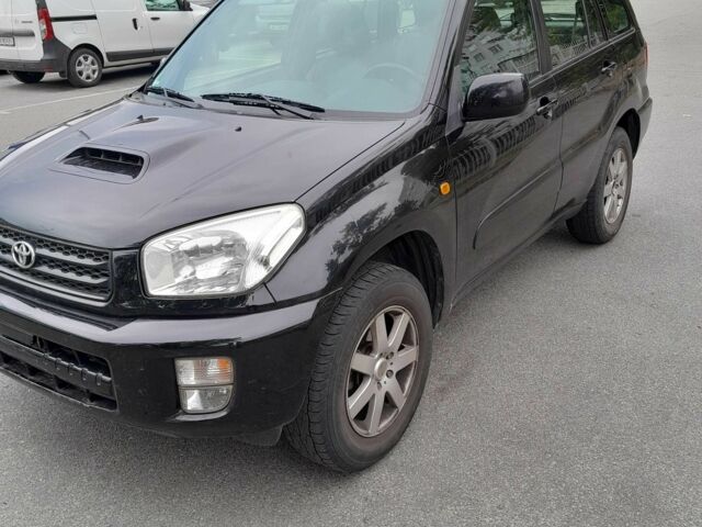 Черный Тойота РАВ 4, объемом двигателя 2 л и пробегом 240 тыс. км за 3700 $, фото 2 на Automoto.ua