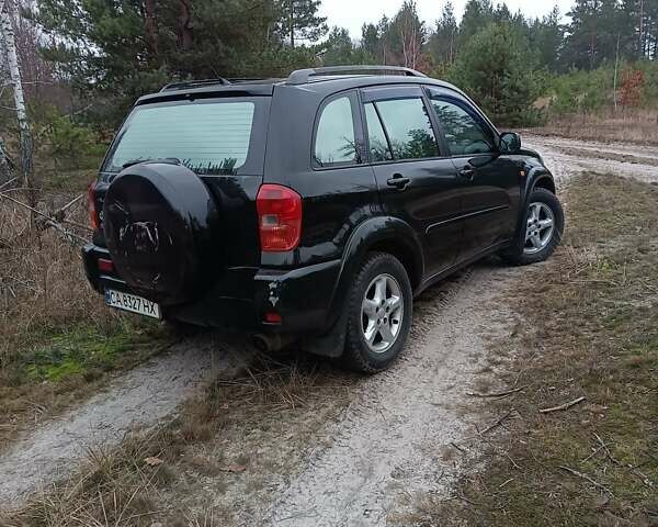 Чорний Тойота РАВ 4, об'ємом двигуна 2 л та пробігом 358 тис. км за 6800 $, фото 2 на Automoto.ua