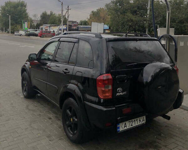 Чорний Тойота РАВ 4, об'ємом двигуна 2 л та пробігом 300 тис. км за 6899 $, фото 2 на Automoto.ua