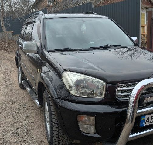 Черный Тойота РАВ 4, объемом двигателя 2 л и пробегом 285 тыс. км за 6000 $, фото 4 на Automoto.ua