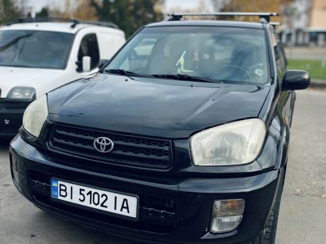 Черный Тойота РАВ 4, объемом двигателя 2 л и пробегом 30 тыс. км за 5000 $, фото 2 на Automoto.ua