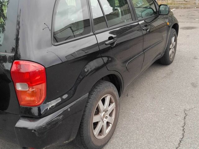 Черный Тойота РАВ 4, объемом двигателя 2 л и пробегом 240 тыс. км за 3700 $, фото 3 на Automoto.ua