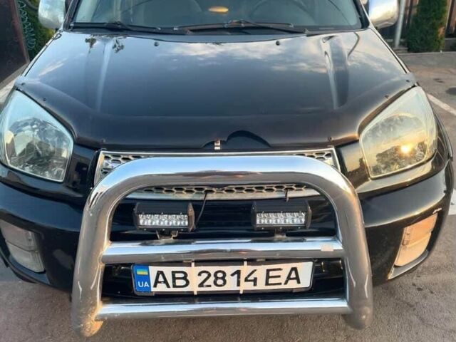 Черный Тойота РАВ 4, объемом двигателя 2 л и пробегом 285 тыс. км за 6000 $, фото 1 на Automoto.ua