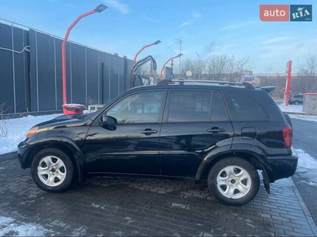 Черный Тойота РАВ 4, объемом двигателя 2 л и пробегом 330 тыс. км за 5400 $, фото 3 на Automoto.ua