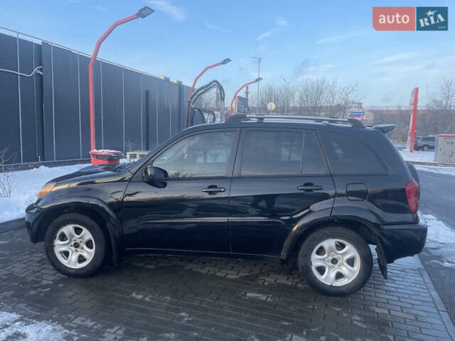 Черный Тойота РАВ 4, объемом двигателя 2 л и пробегом 217 тыс. км за 5800 $, фото 7 на Automoto.ua