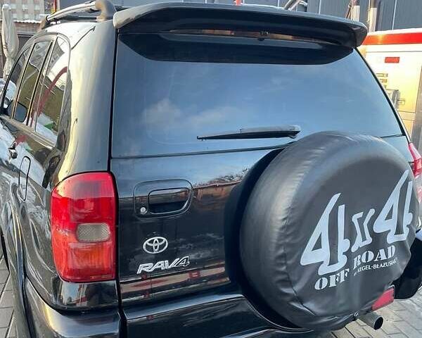 Черный Тойота РАВ 4, объемом двигателя 2 л и пробегом 330 тыс. км за 5400 $, фото 6 на Automoto.ua