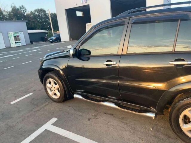 Черный Тойота РАВ 4, объемом двигателя 2 л и пробегом 285 тыс. км за 6000 $, фото 2 на Automoto.ua