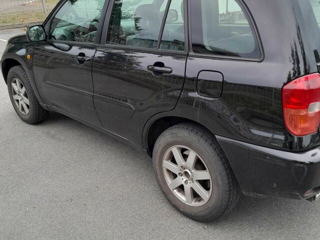 Черный Тойота РАВ 4, объемом двигателя 2 л и пробегом 240 тыс. км за 3700 $, фото 5 на Automoto.ua