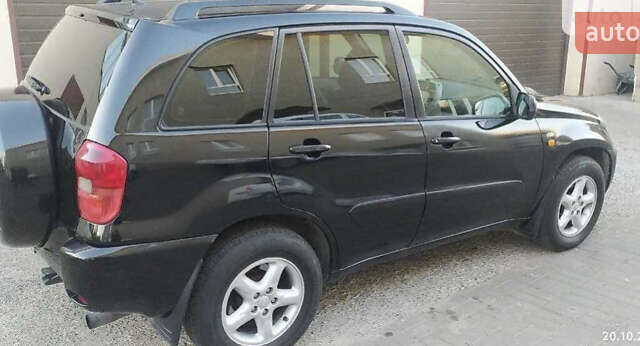 Черный Тойота РАВ 4, объемом двигателя 2 л и пробегом 340 тыс. км за 8000 $, фото 1 на Automoto.ua