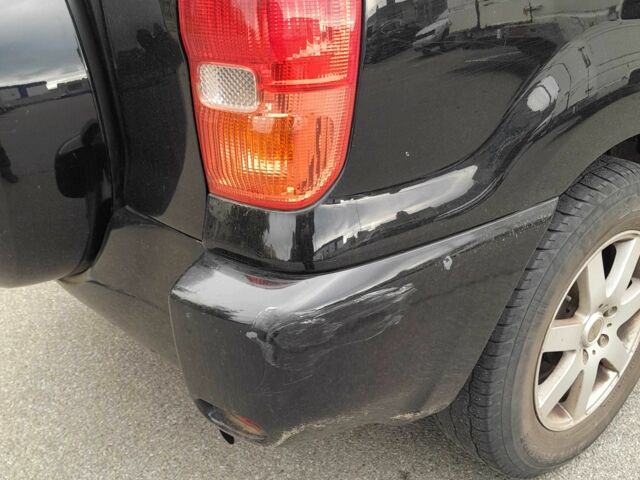 Черный Тойота РАВ 4, объемом двигателя 2 л и пробегом 240 тыс. км за 3700 $, фото 12 на Automoto.ua