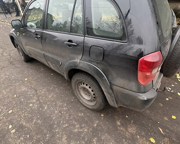 Черный Тойота РАВ 4, объемом двигателя 2 л и пробегом 395 тыс. км за 4200 $, фото 3 на Automoto.ua