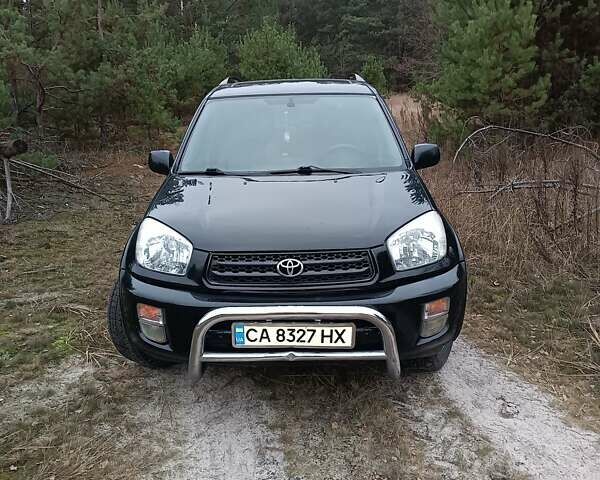 Чорний Тойота РАВ 4, об'ємом двигуна 2 л та пробігом 358 тис. км за 6800 $, фото 1 на Automoto.ua