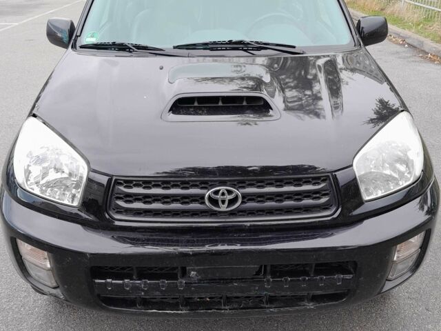 Черный Тойота РАВ 4, объемом двигателя 2 л и пробегом 240 тыс. км за 3700 $, фото 1 на Automoto.ua