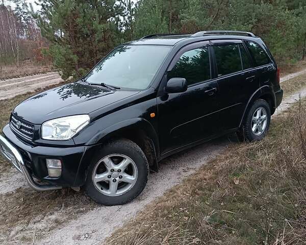 Чорний Тойота РАВ 4, об'ємом двигуна 2 л та пробігом 358 тис. км за 6800 $, фото 5 на Automoto.ua