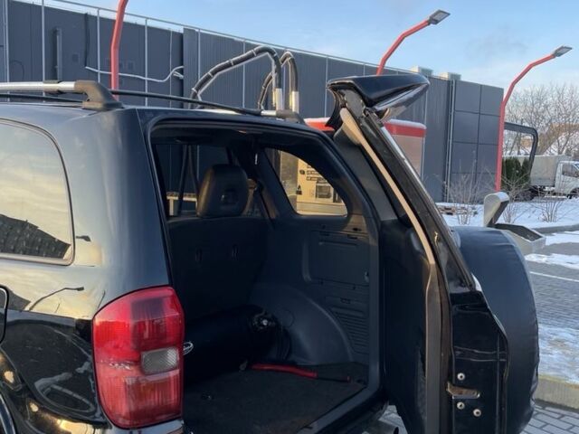 Черный Тойота РАВ 4, объемом двигателя 2 л и пробегом 217 тыс. км за 5400 $, фото 5 на Automoto.ua