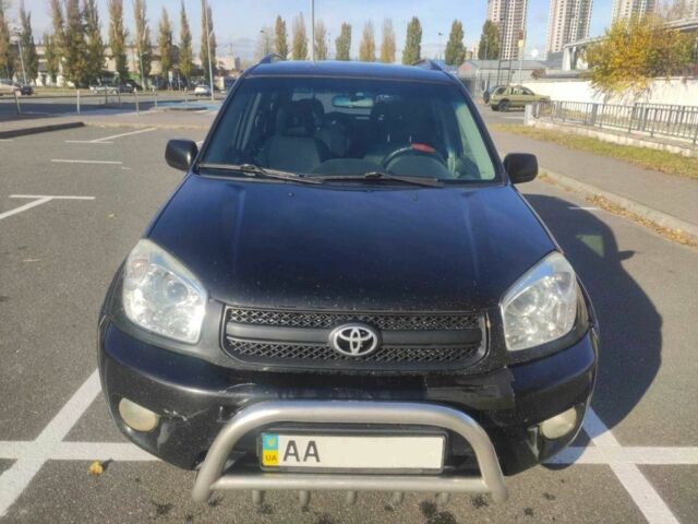 Черный Тойота РАВ 4, объемом двигателя 2 л и пробегом 506 тыс. км за 5300 $, фото 2 на Automoto.ua