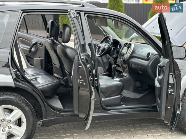 Черный Тойота РАВ 4, объемом двигателя 2 л и пробегом 230 тыс. км за 7850 $, фото 47 на Automoto.ua