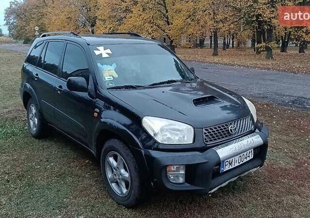 Черный Тойота РАВ 4, объемом двигателя 2 л и пробегом 312 тыс. км за 4300 $, фото 6 на Automoto.ua