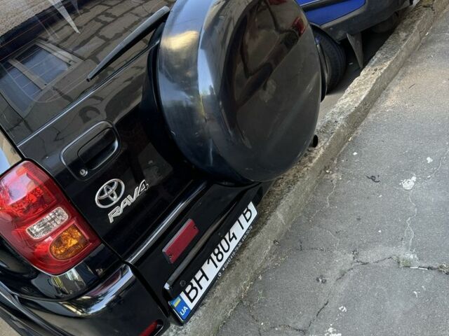 Тойота РАВ 4 2004 в Одессе на Automoto.ua Черный Тойота РАВ 4, объемом двигателя 2 л и пробегом 274 тыс. км за 7000 $, фото 4 на Automoto.ua