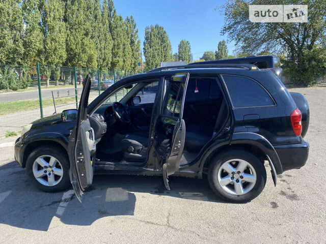 Черный Тойота РАВ 4, объемом двигателя 2 л и пробегом 262 тыс. км за 8800 $, фото 3 на Automoto.ua