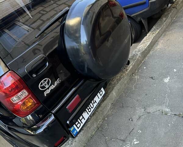 Черный Тойота РАВ 4, объемом двигателя 2 л и пробегом 279 тыс. км за 7000 $, фото 12 на Automoto.ua