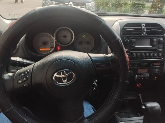 Чорний Тойота РАВ 4, об'ємом двигуна 2 л та пробігом 504 тис. км за 5700 $, фото 5 на Automoto.ua