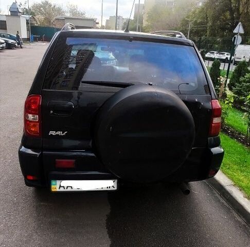 Чорний Тойота РАВ 4, об'ємом двигуна 2 л та пробігом 504 тис. км за 5700 $, фото 3 на Automoto.ua