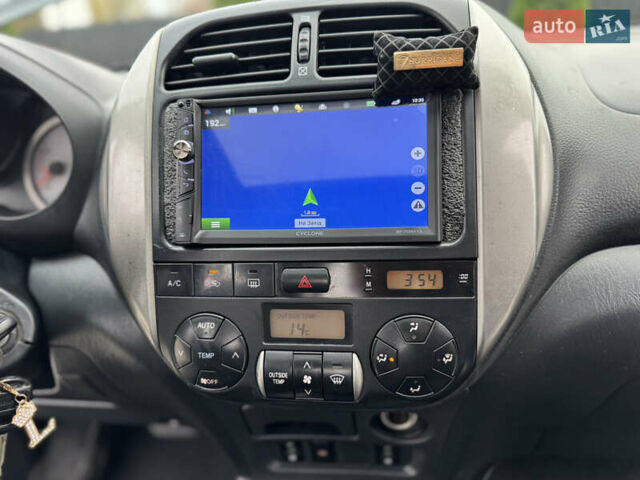 Черный Тойота РАВ 4, объемом двигателя 2 л и пробегом 230 тыс. км за 7850 $, фото 42 на Automoto.ua