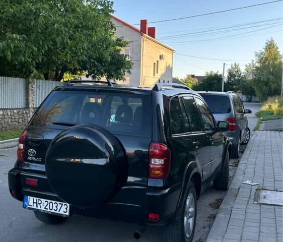 Черный Тойота РАВ 4, объемом двигателя 2 л и пробегом 350 тыс. км за 4500 $, фото 1 на Automoto.ua