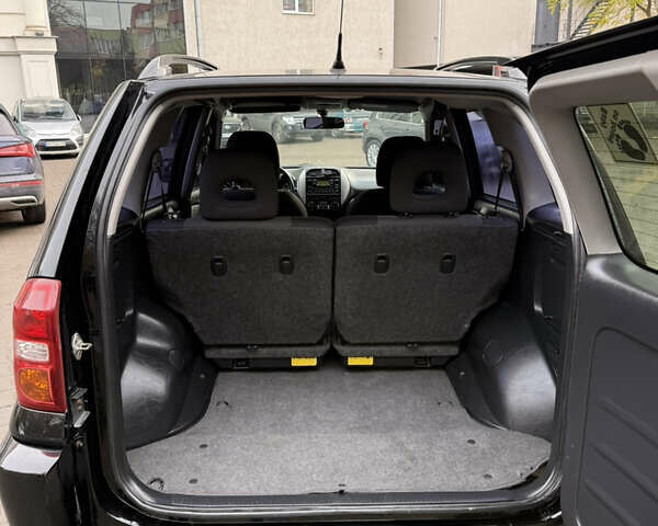 Черный Тойота РАВ 4, объемом двигателя 2 л и пробегом 230 тыс. км за 6500 $, фото 8 на Automoto.ua