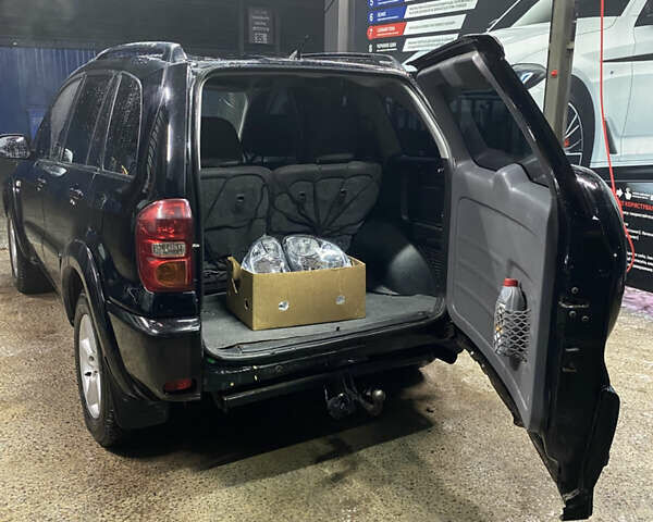 Черный Тойота РАВ 4, объемом двигателя 2 л и пробегом 269 тыс. км за 7500 $, фото 12 на Automoto.ua