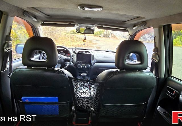 Черный Тойота РАВ 4, объемом двигателя 2 л и пробегом 224 тыс. км за 9000 $, фото 12 на Automoto.ua