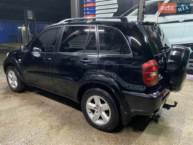 Черный Тойота РАВ 4, объемом двигателя 2 л и пробегом 269 тыс. км за 7500 $, фото 4 на Automoto.ua