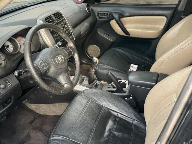 Черный Тойота РАВ 4, объемом двигателя 2 л и пробегом 250 тыс. км за 4800 $, фото 4 на Automoto.ua