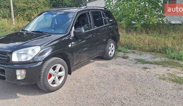 Черный Тойота РАВ 4, объемом двигателя 2 л и пробегом 250 тыс. км за 5200 $, фото 8 на Automoto.ua