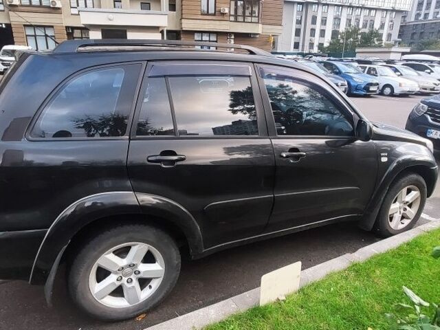 Чорний Тойота РАВ 4, об'ємом двигуна 2 л та пробігом 504 тис. км за 5700 $, фото 2 на Automoto.ua