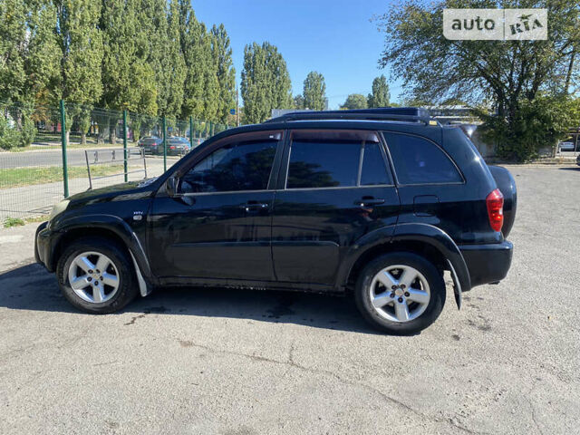 Черный Тойота РАВ 4, объемом двигателя 2 л и пробегом 262 тыс. км за 8800 $, фото 6 на Automoto.ua