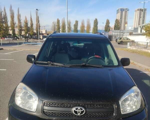 Черный Тойота РАВ 4, объемом двигателя 2 л и пробегом 506 тыс. км за 5300 $, фото 2 на Automoto.ua