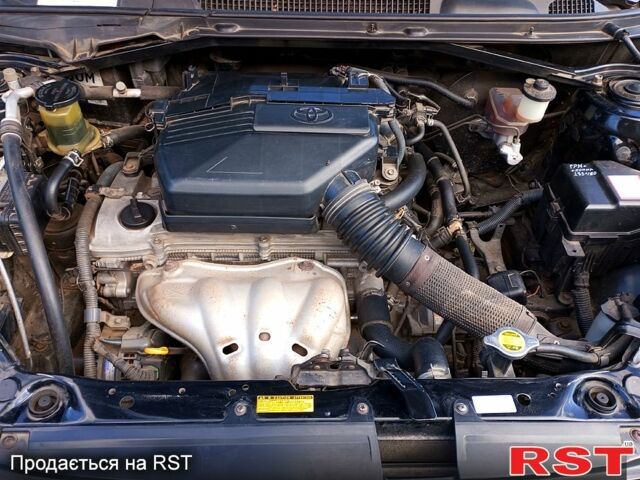 Чорний Тойота РАВ 4, об'ємом двигуна 2 л та пробігом 251 тис. км за 7100 $, фото 5 на Automoto.ua