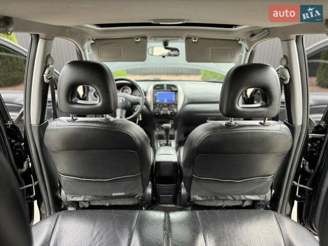 Черный Тойота РАВ 4, объемом двигателя 2 л и пробегом 230 тыс. км за 7850 $, фото 33 на Automoto.ua