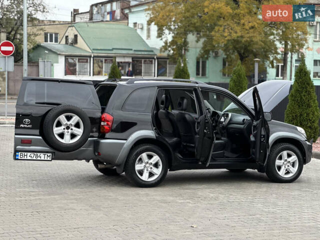 Черный Тойота РАВ 4, объемом двигателя 2 л и пробегом 230 тыс. км за 7850 $, фото 46 на Automoto.ua