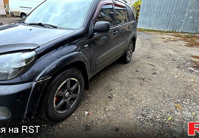 Черный Тойота РАВ 4, объемом двигателя 2 л и пробегом 224 тыс. км за 9000 $, фото 7 на Automoto.ua