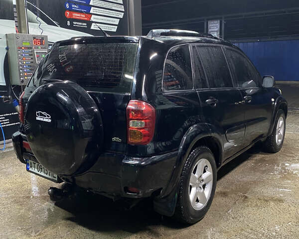 Черный Тойота РАВ 4, объемом двигателя 2 л и пробегом 269 тыс. км за 7500 $, фото 1 на Automoto.ua