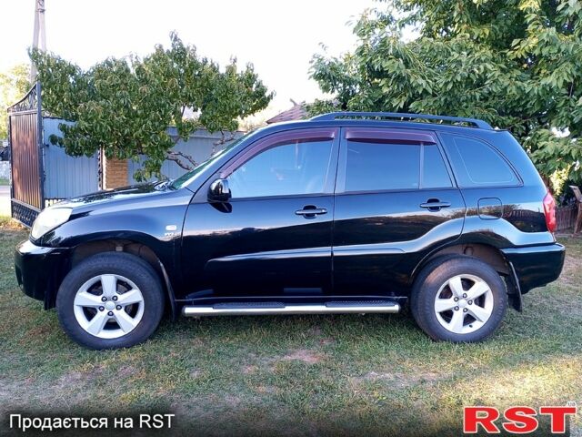 Чорний Тойота РАВ 4, об'ємом двигуна 2 л та пробігом 251 тис. км за 7100 $, фото 2 на Automoto.ua